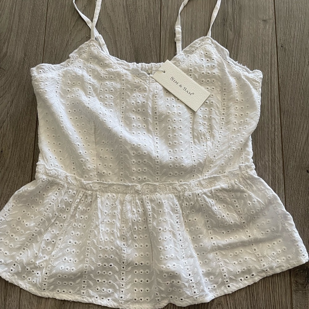 White flowy top